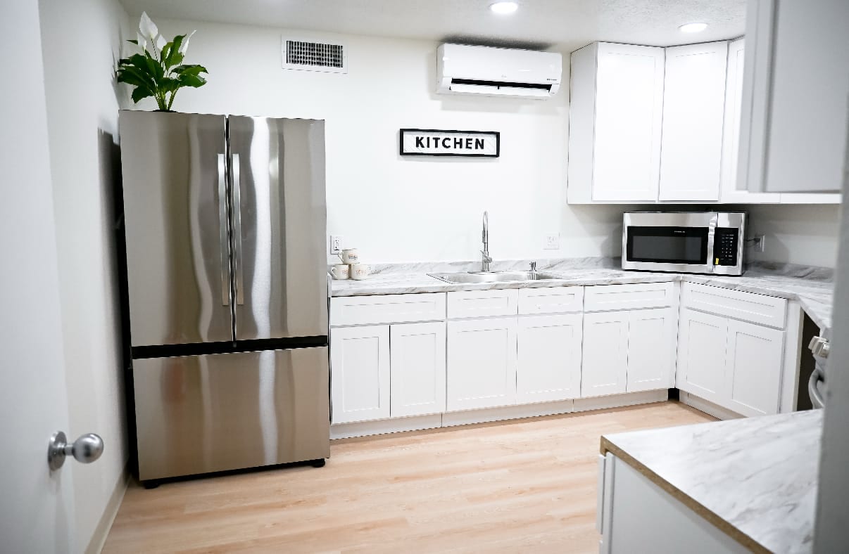 Full kitchen with stainless appliances for residential clients at Ascend Recovery Center in Albuquerque
